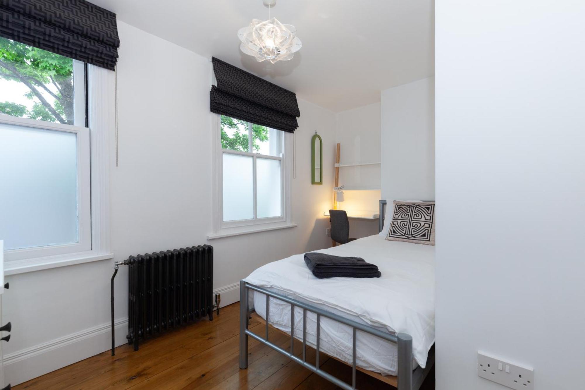 Trendy Terraced House In *